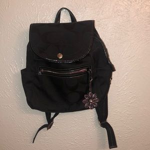 Mid size black Coach backpack